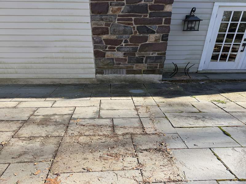 Before powerwashing stone patio